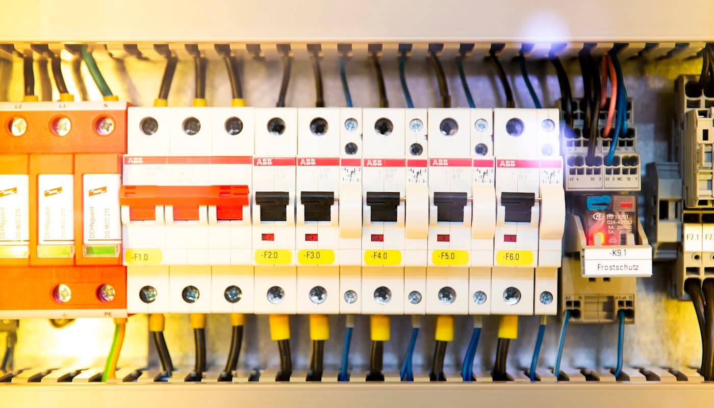 A neatly wired industrial breaker panel with labelled circuits